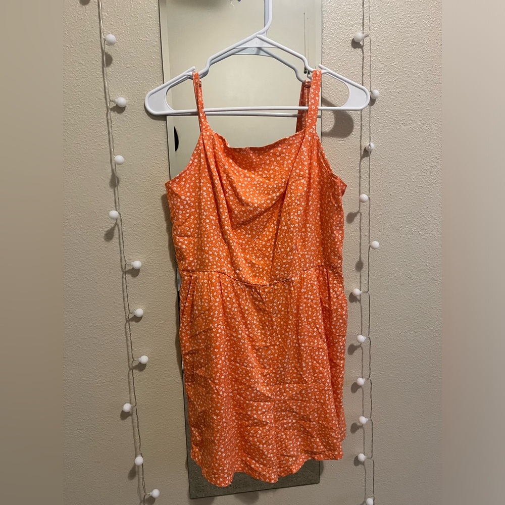 Orange and white floral romper from Old Navy.
